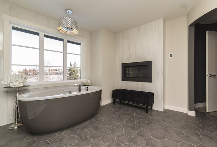 Modern bathroom featuring a freestanding bathtub
